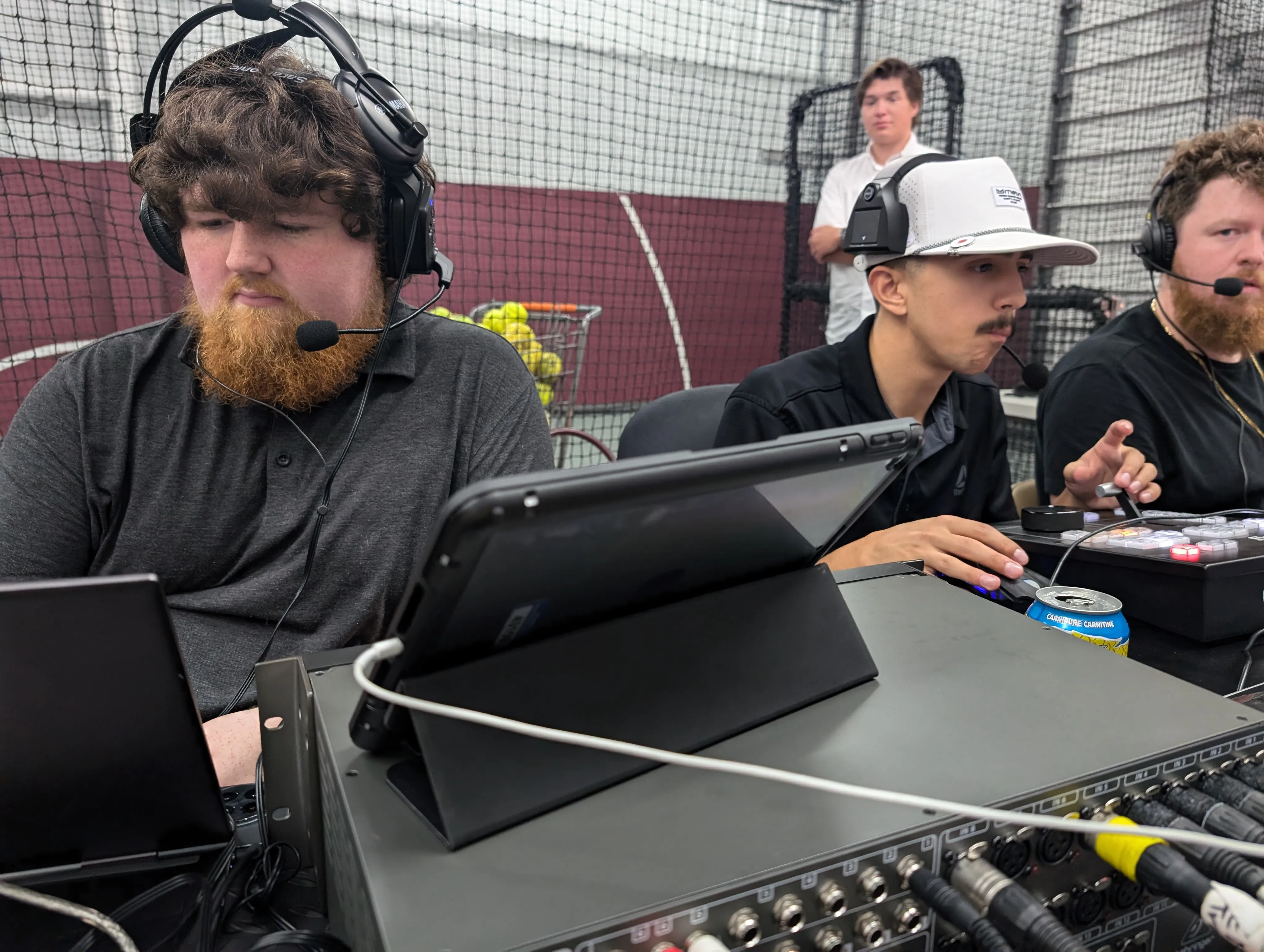 DuneVision crew at production desks operating a live webcast